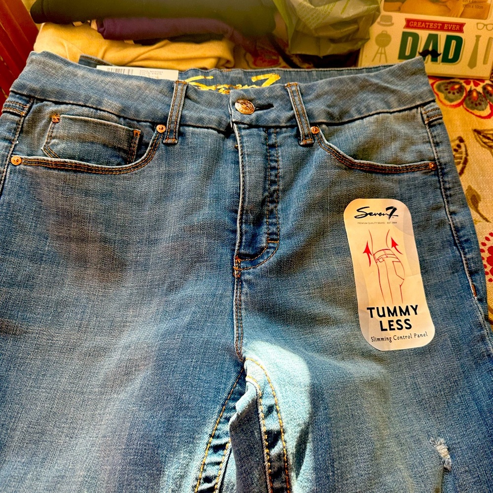 A lot of FIVE size 12 women’s jeans. Some still have tags on.